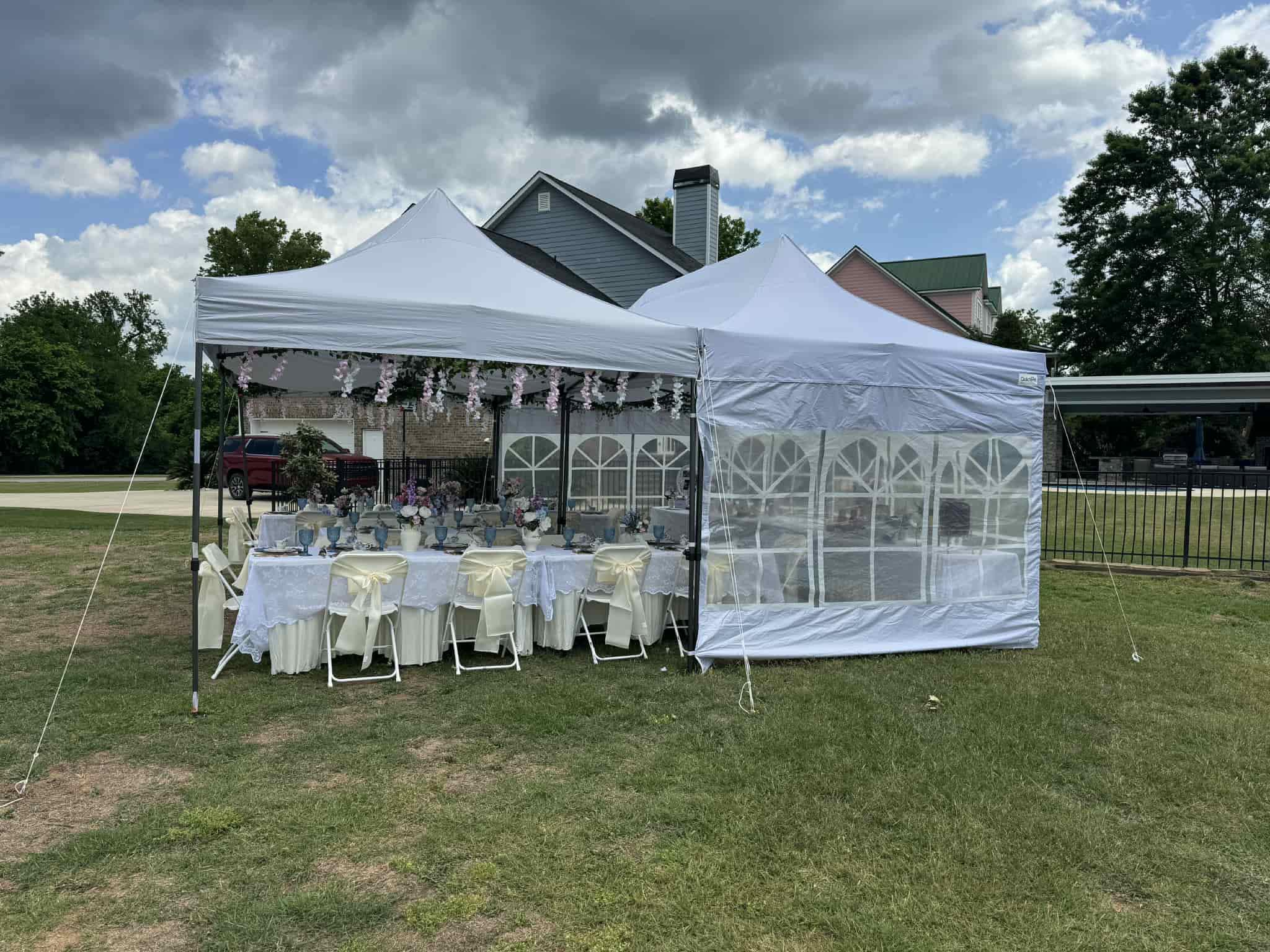 Two 10x20 tents configured for expanded guest seating